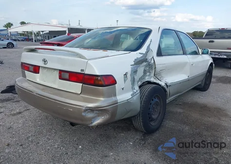 1999 Toyota Camry Le z USA, uszkodzony, nr VIN JT2BG28K1X0335552